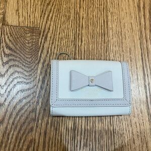 Elegant Cream Wallet with Bow Accent